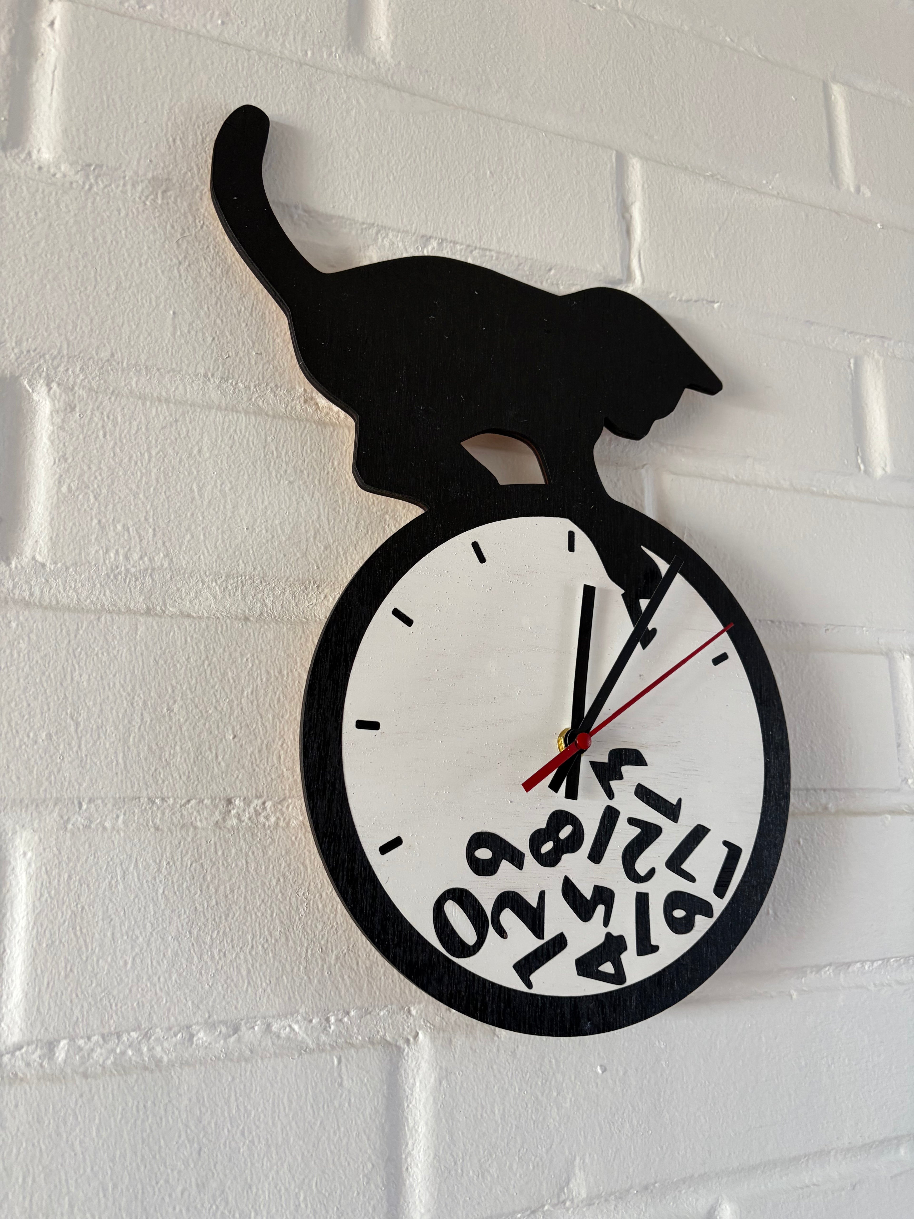 reloj de pared gato travieso